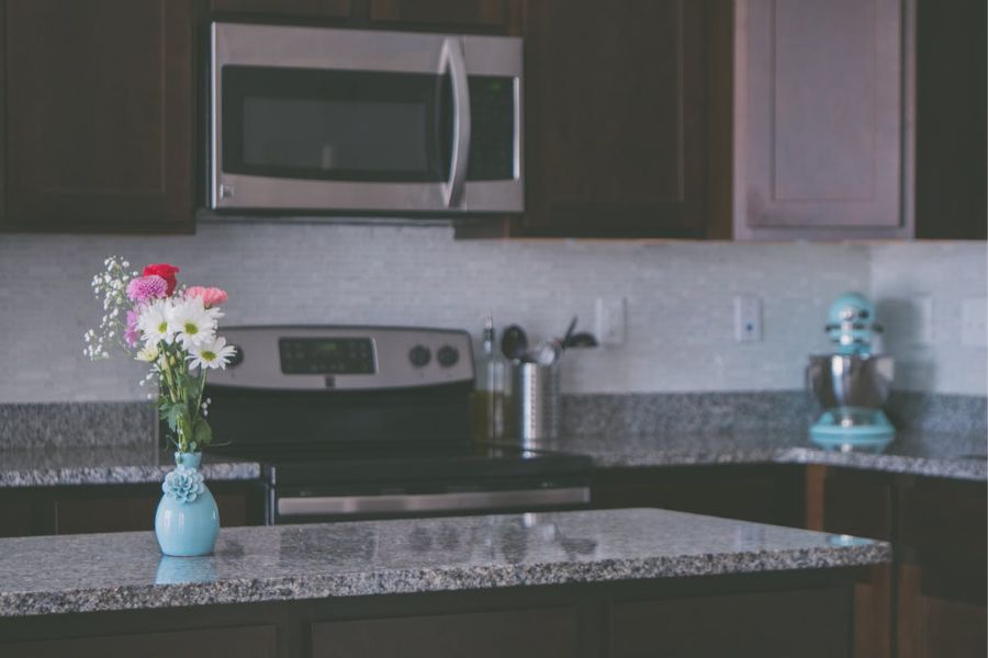 A microwave outlet in a kitchen.